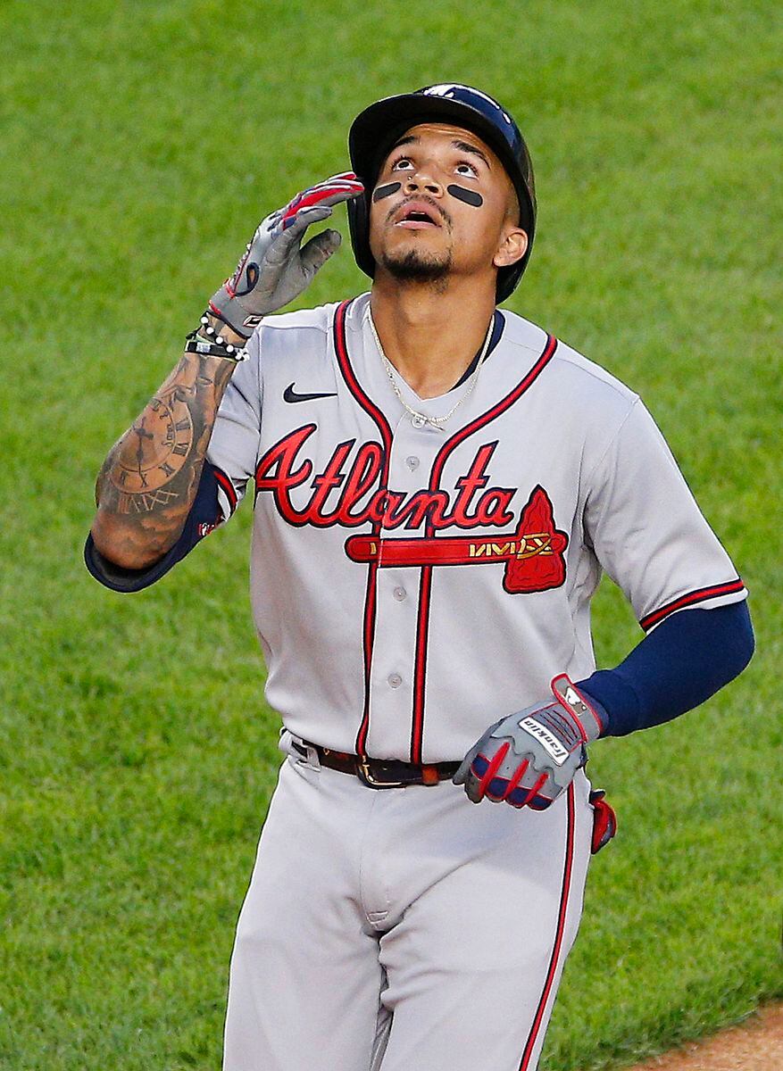 ATLANTA, GA – APRIL 26: Atlanta Braves second baseman Ozzie Albies (1)  catches a line drive in front of teammate Johan Camargo (17) during the  game between the Atlanta Braves and the